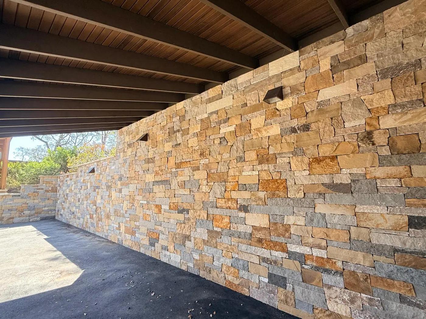 Tall stacked natural stone wall
